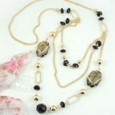 Colar Longo Dourado com Pedras Transparentes